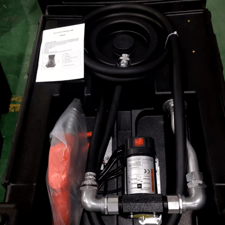Mobile Diesel Tank With Pump components including hoses, pump, and manual instructions.